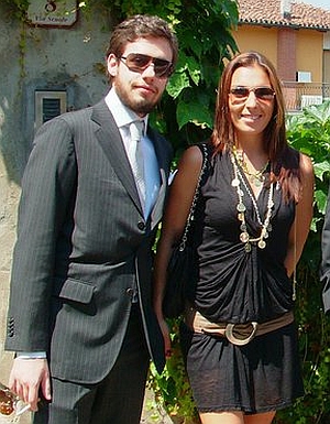 Massimiliano e Carla, qui elegantissimi la scorsa estate al matrimonio di un altro pro (Rocco Palumbo, con la sua Giulia)